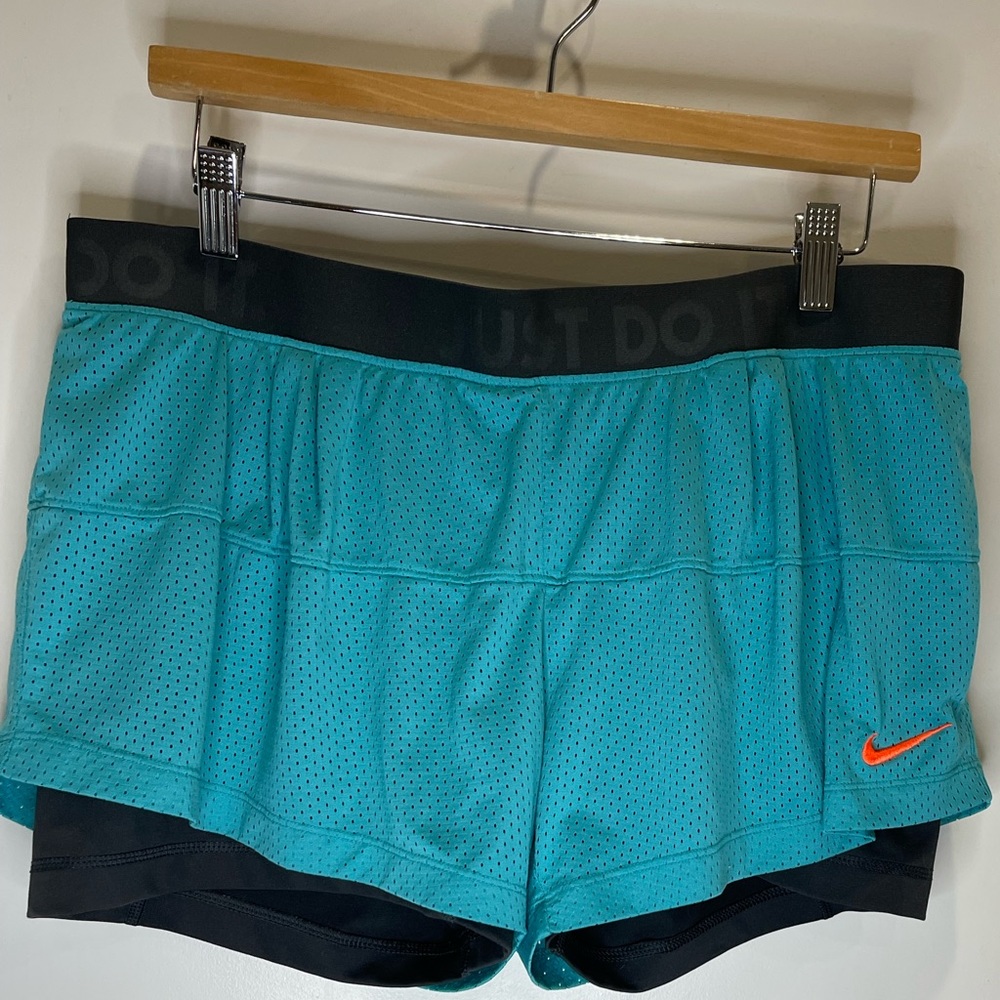 Nike dri-fit woman’s running shorts size XL teal with gray